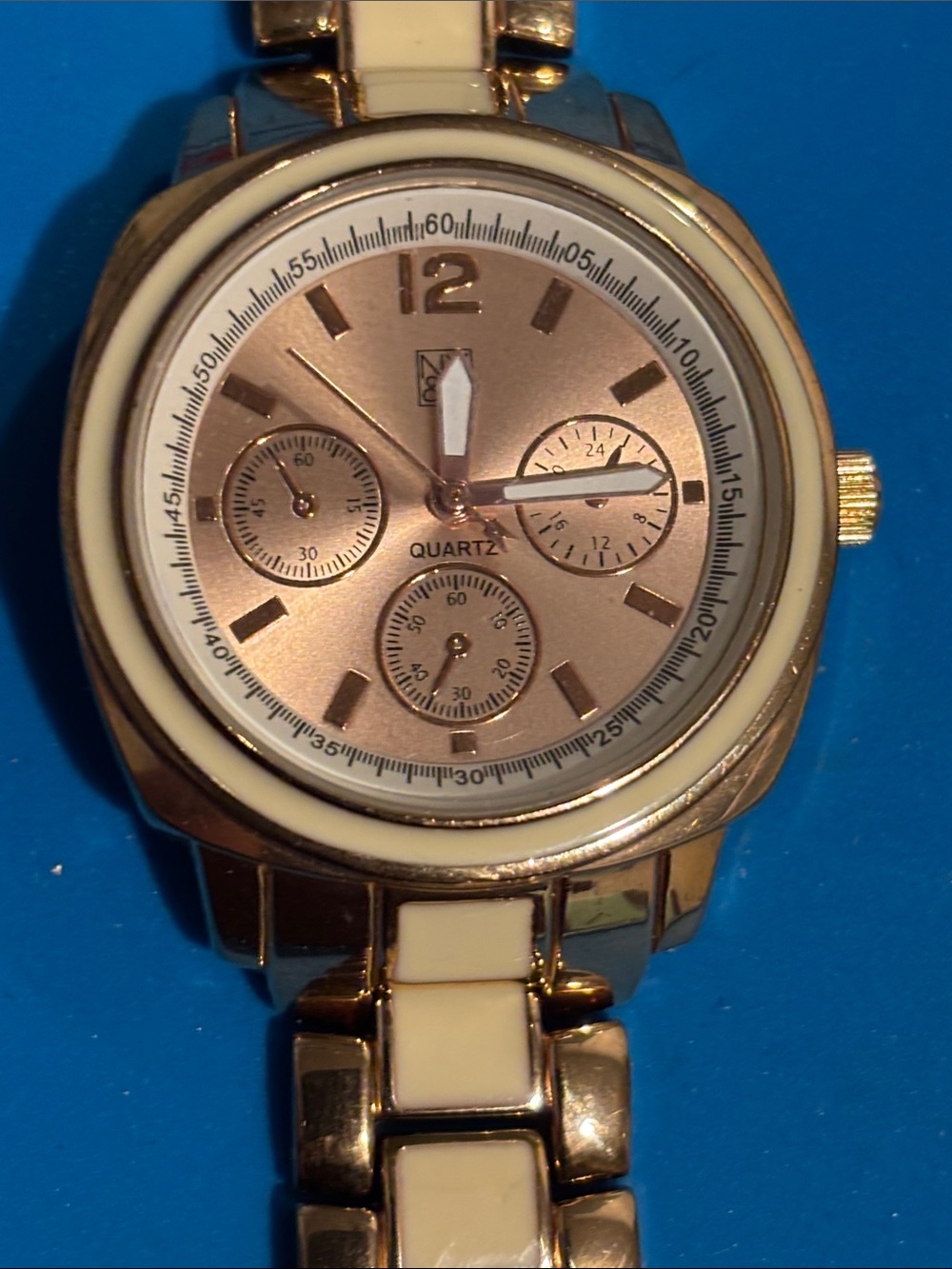 New York & Company Gold Tone Watch with Rose Gold Dial and Cream Accents